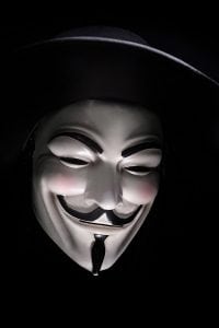 A smiling Guy Fawkes (hacker) mask